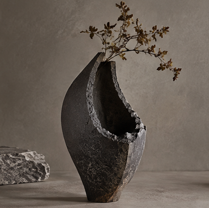 PULMORY black ruins form vase with dried branch, asymmetric broken edge raw stone texture, clean product shot