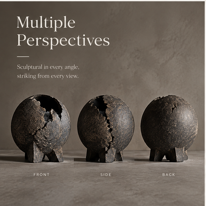 PULMORY black cracked sphere vase a quiet presence lifestyle on stone surface with books